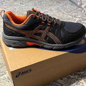 Never worn!!  Men’s Asics sneakers